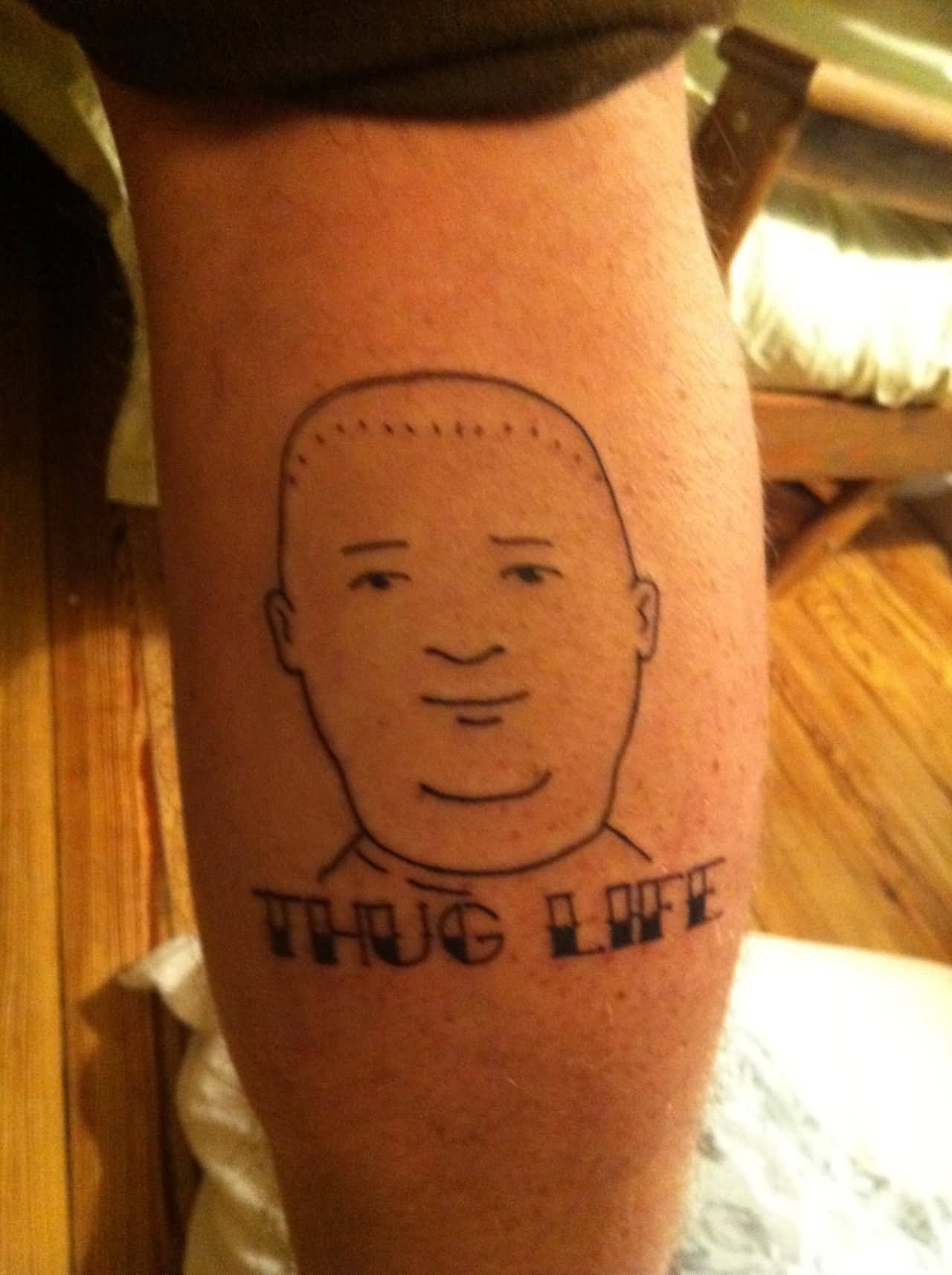 Thug Life - Black Outline Face Tattoo On Leg Calf