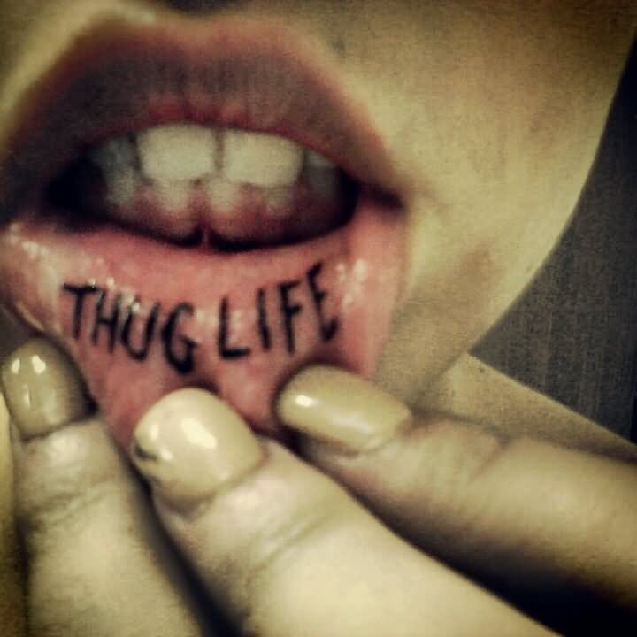 Thug Life Lettering Tattoo On Inner Lip