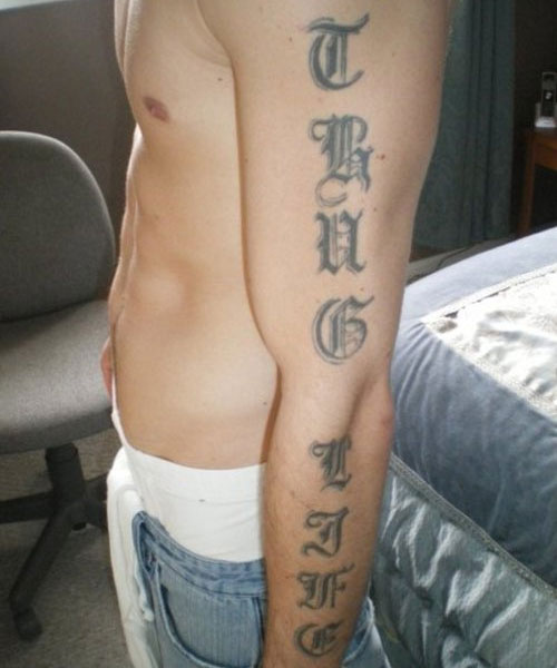 Thug Life Lettering Tattoo On Man Left Full Sleeve