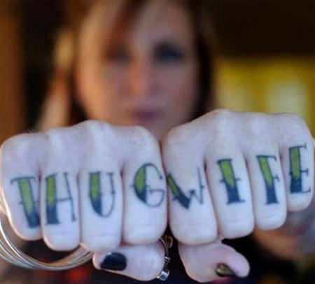 Thug Wife Lettering Tattoo On Girl Both Hand Fingers