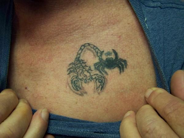 Tiny Scorpio and Crab Tattoo On Chest