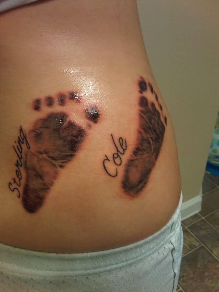 Two Footprints Tattoo Design For Lower Back