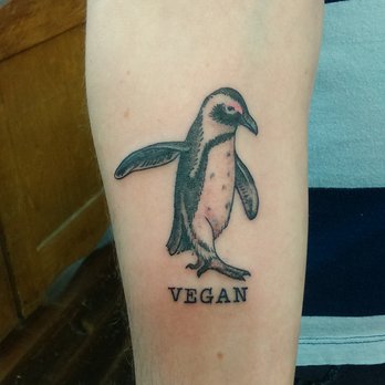 Vegan Grey Ink Penguin Tattoo On Bicep