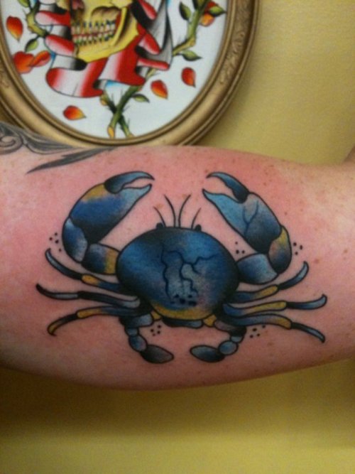 Yello And Blue Ink Crab Tattoo On Muscles