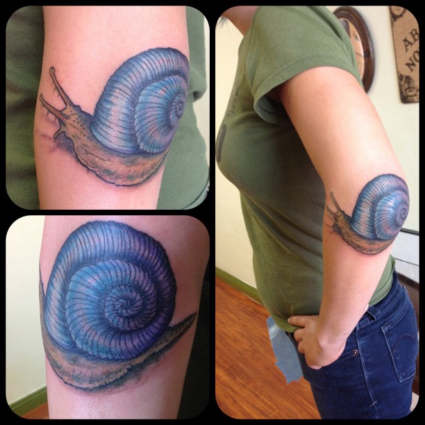 Amazing Snail Tattoo On Girl Left Elbow