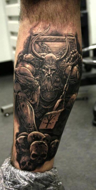 Angry Viking Skull Tattoo On Back Leg