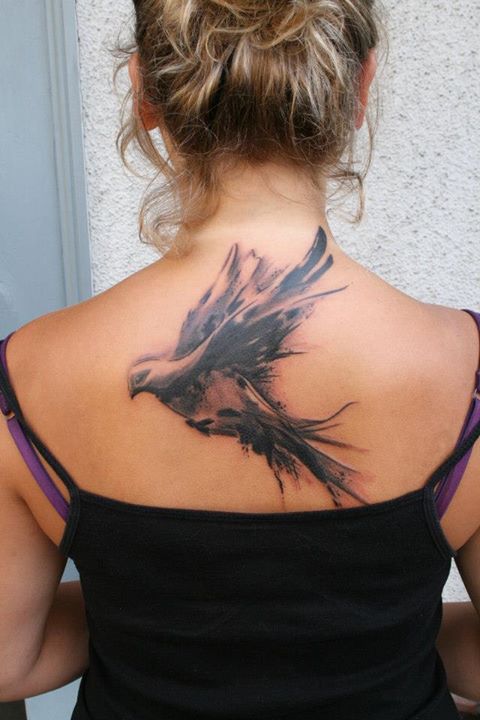 Attractive Flying Pigeon Tattoo On Girl Upper Back