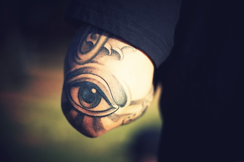 Black And Grey Eye Tattoo On Left Elbow