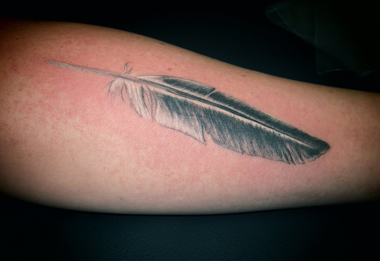 Black And White Pigeon Feather Tattoo Design For Arm