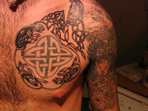 Black Celtic Knot Tattoo On Man Chest