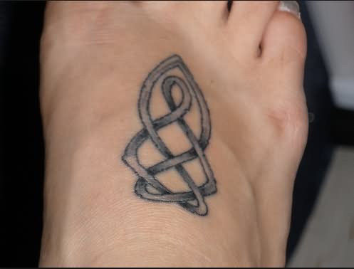 Black Ink Celtic Knot Tattoo On Foot