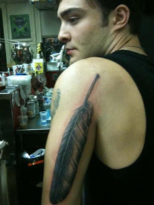 Black Ink Pigeon Feather Tattoo On Man Left Half Sleeve