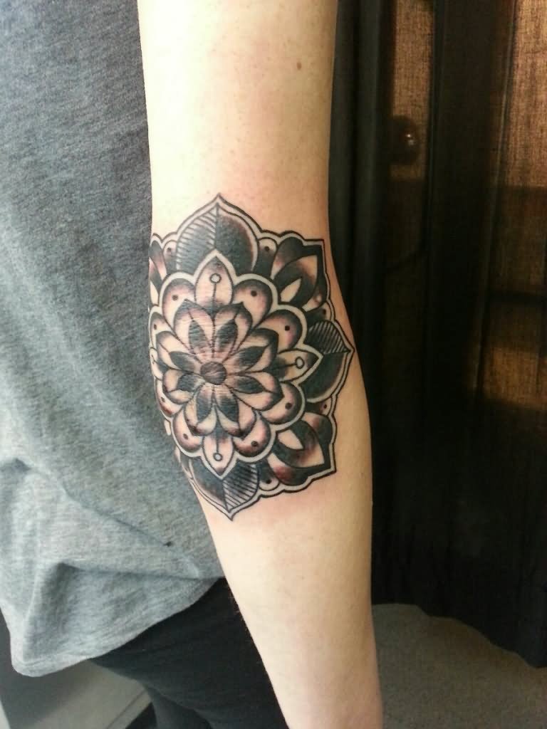 Black Ink Traditional Flower Tattoo Design For Elbow