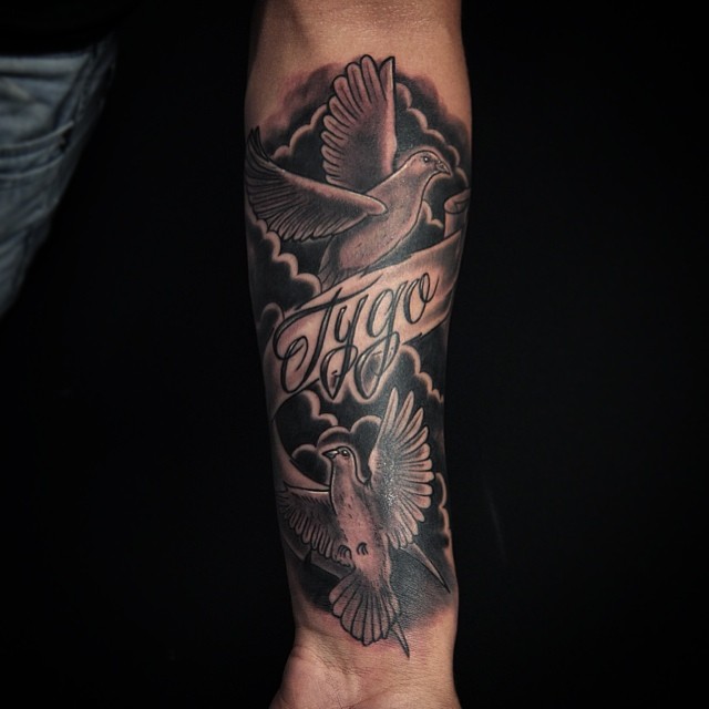 Black Ink Two Flying Pigeon With Banner Tattoo Design For Forearm