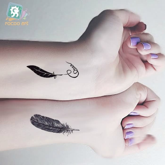 Black Ink Two Pigeon Feather Tattoo On Girl Both Wrist