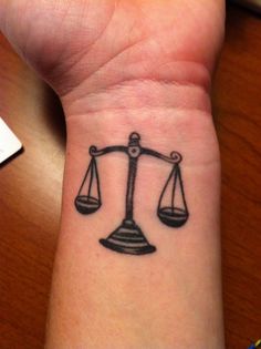Black Justice Scale Tattoo On Wrist