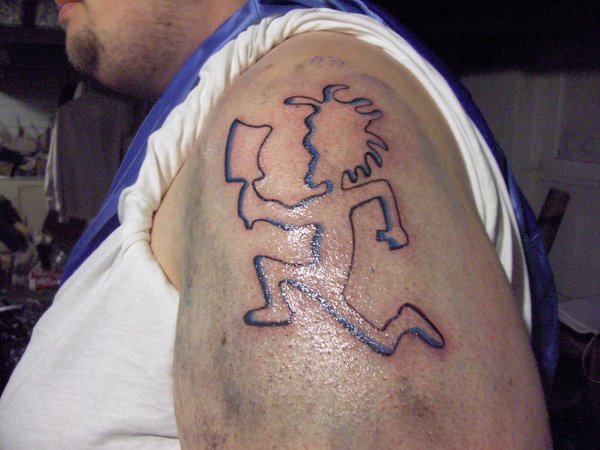 Black Outline Hatchetman Tattoo On Man Left Shoulder