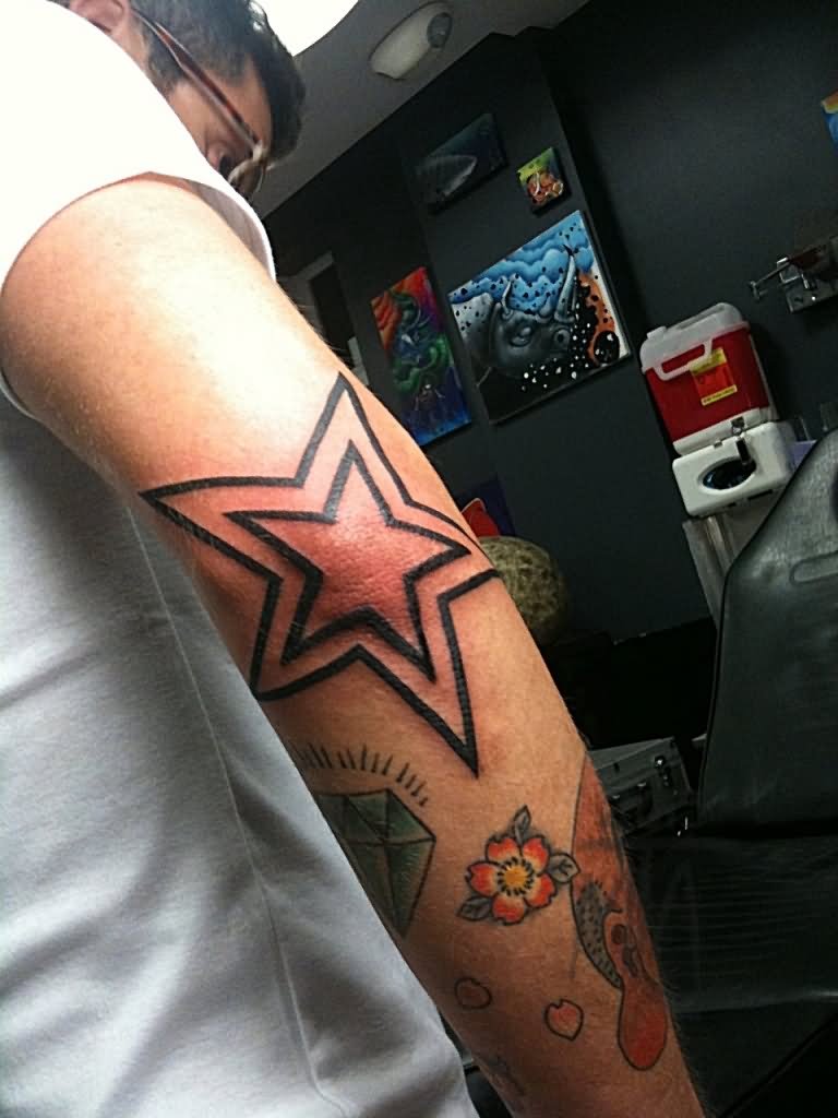Black Outline Two Stars Tattoo On Elbow