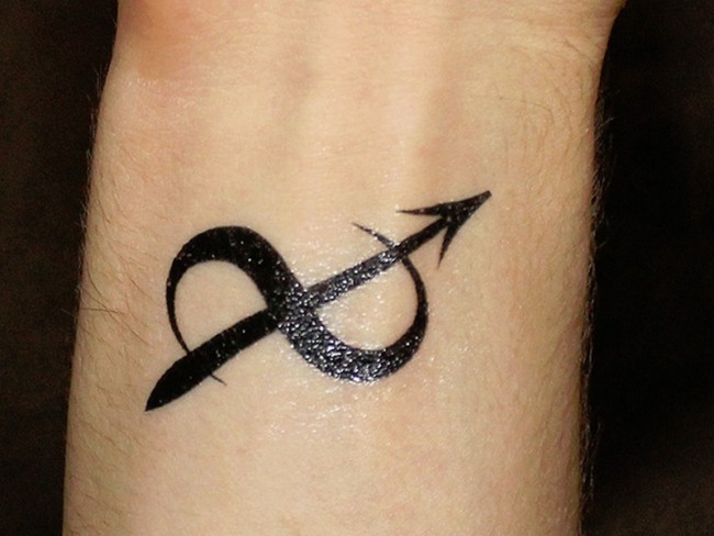 Black Sagittarius Tattoo On Wrist
