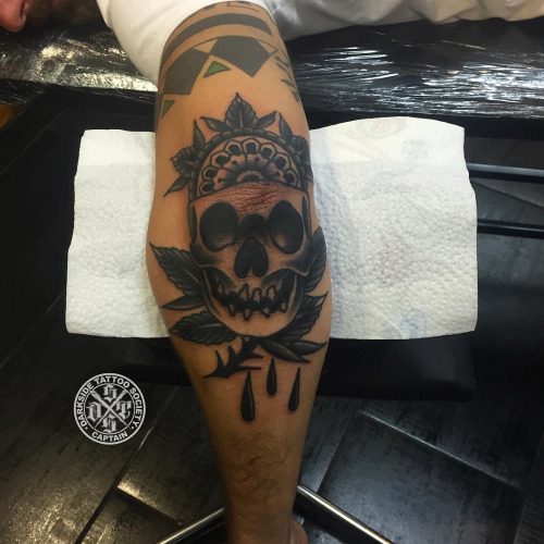 Black Traditional Skull Tattoo On Man Left Elbow