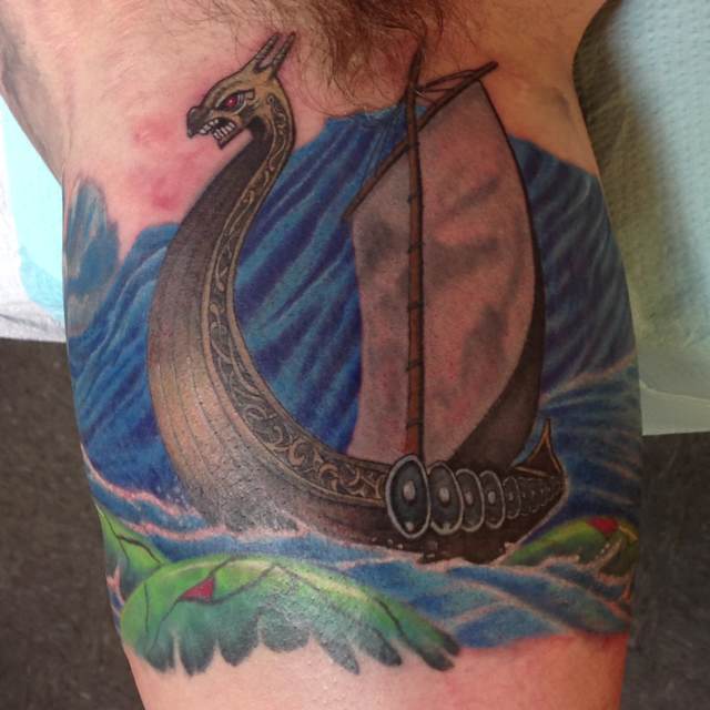 Color Ink Viking Ship Tattoo On Bicep