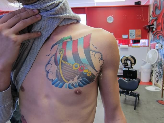 Colored Viking Ship Tattoo On Chest For Men