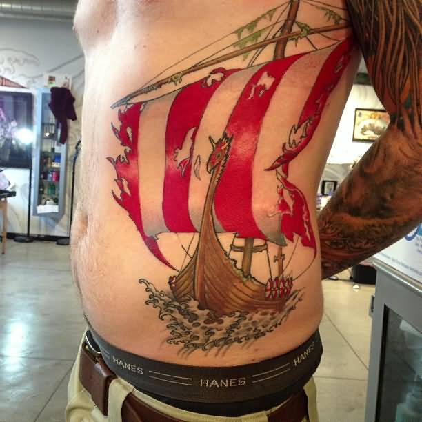 Colored Viking Ship Tattoo On Man Left Rib Side