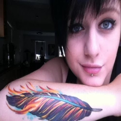 Colorful Pigeon Feather Tattoo On Girl Right Forearm