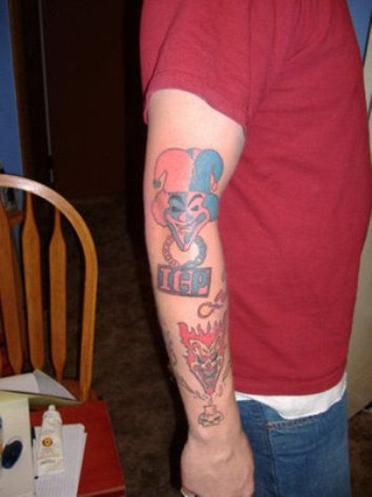 ICP Joker Tattoo On Man Right Arm