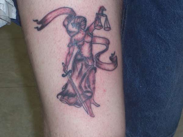 Justice Scale And Sword In Girl Hand With Ribbon Tattoo Design