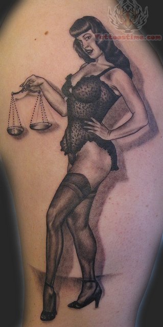 Justice Scale In Pinup Girl Hand Tattoo Design