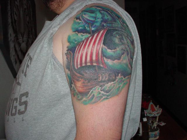 Man Left Shoulder Viking Ship Tattoo