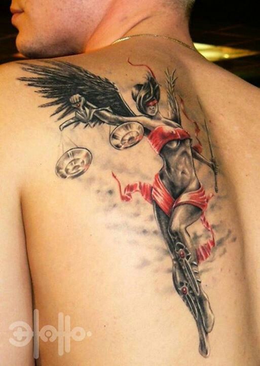 Red And Black Lady Justice Tattoo On Man Left Back Shoulder