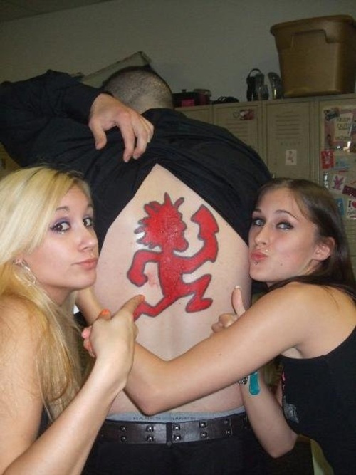 Red ICP Logo Tattoo On Man Full Back