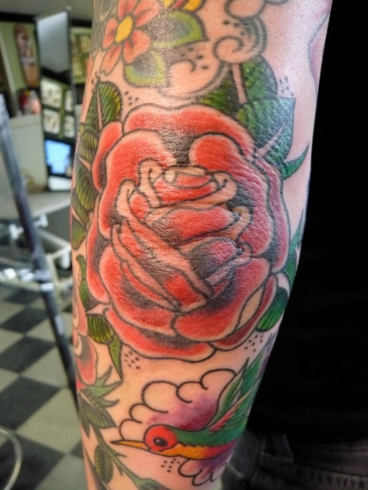 Red Rose Tattoo On Left Elbow