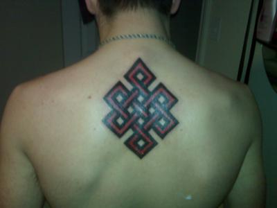 Red Square Endless Knot Tattoo On Man Upper Back