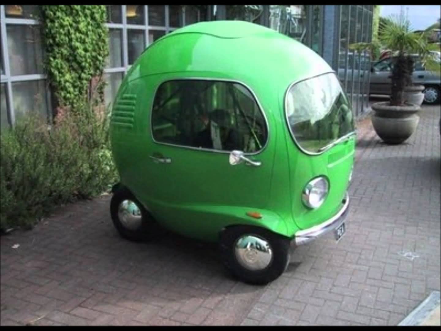 Small Green Car Funny Looking Picture