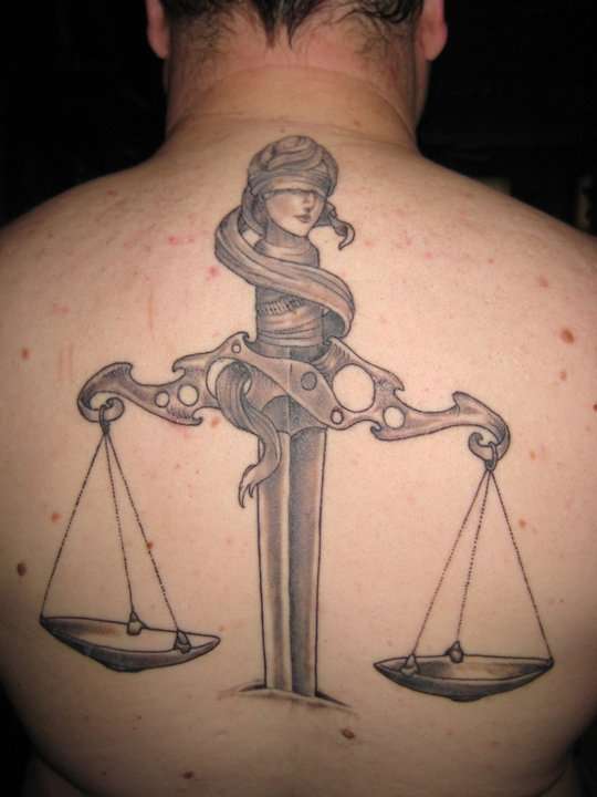 Sword Justice Scale Tattoo On Upper Back