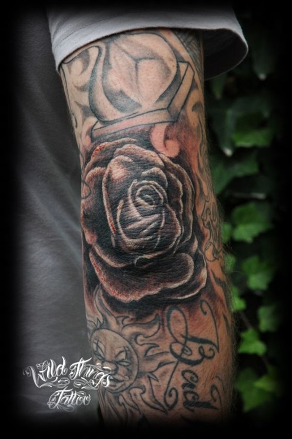 Traditional Black Rose Tattoo Design For Elbow