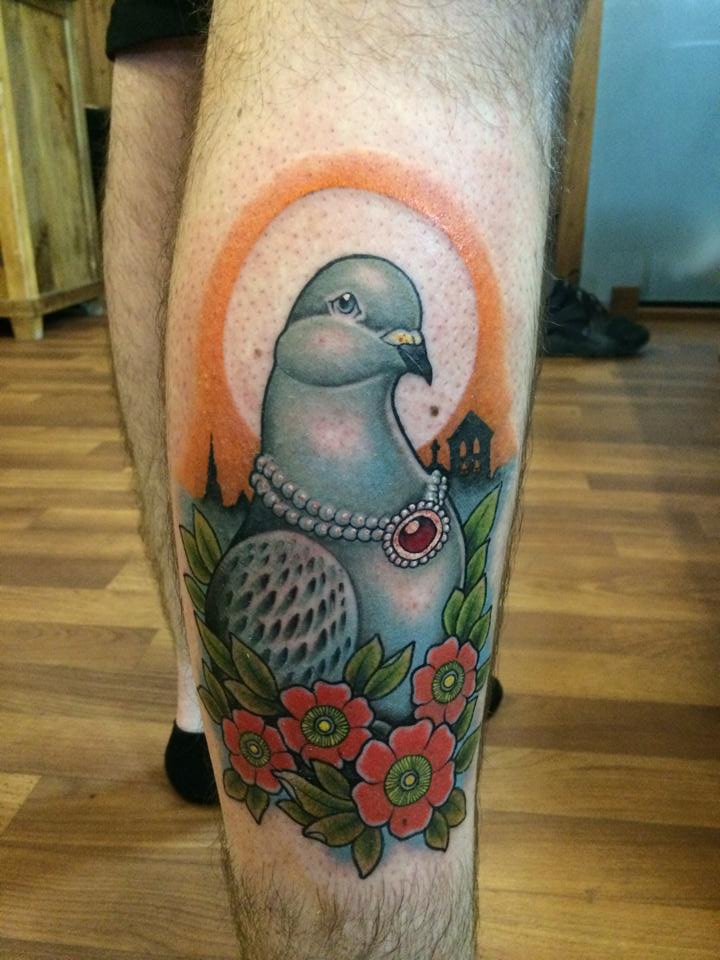 Traditional Pigeon With Flowers Tattoo On Leg