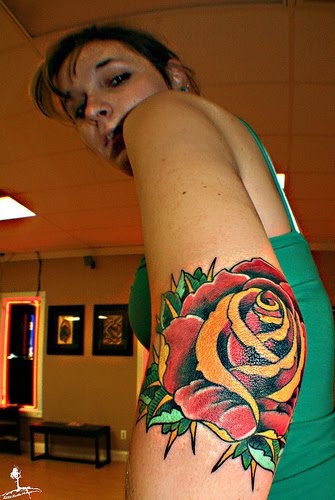 Traditional Rose Tattoo On Girl Left Elbow
