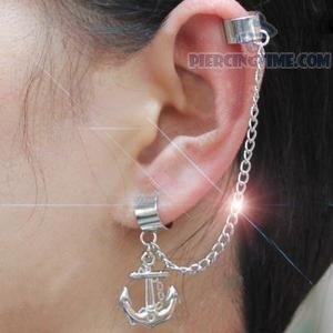 Anchor Lobe And Chain Piercing On Left Ear