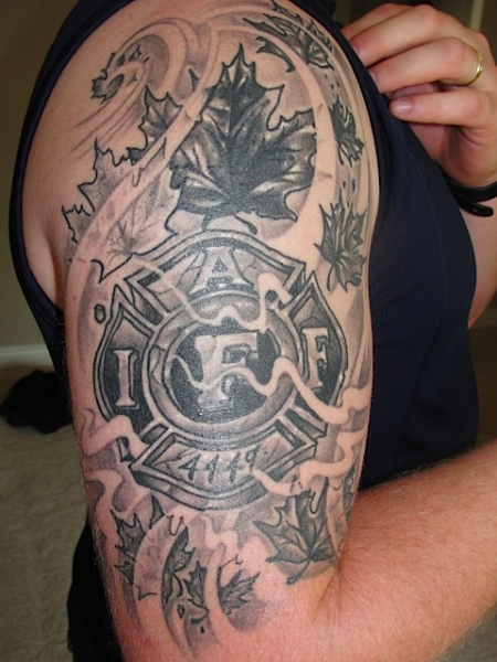 Awesome Grey Ink Firefighter Logo Tattoo On Right Half Sleeve