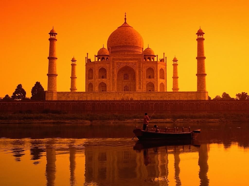 Back Picture Of Taj Mahal At Sunset Across Yamuna River