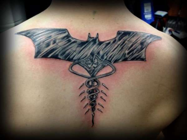 BatMan Logo Medical Symbol Tattoo On Upper Back