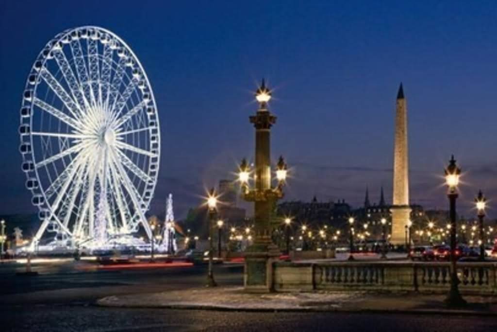 Beautiful Ferris Wheel And Place de la Concorde At Night