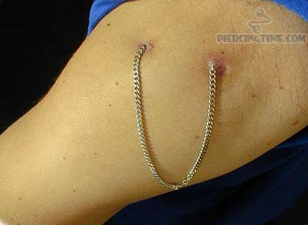 Bicep Piercing With Chain
