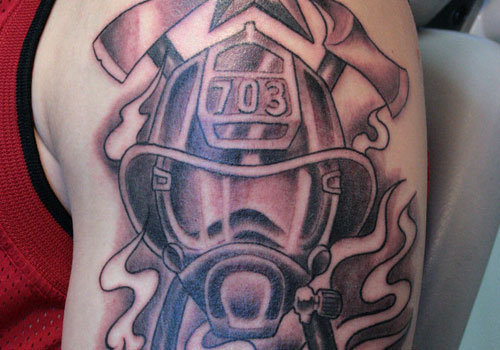Black And Grey Firefighter Mask Tattoo Design For Shoulder