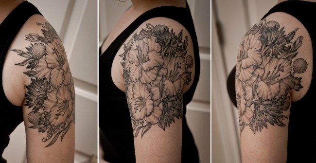 Black And Grey Floral Tattoo On Left Shoulder