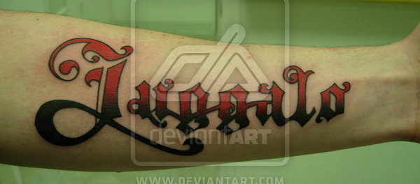 Black And Red Ink Juggalo Tattoo On Forearm